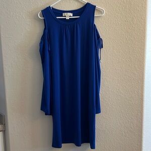 Women’s Michael Kors peek a boo shoulder long sleeved dress.  Size M never worn